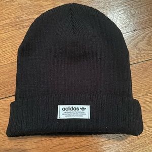 Black Adidas beanie with white label